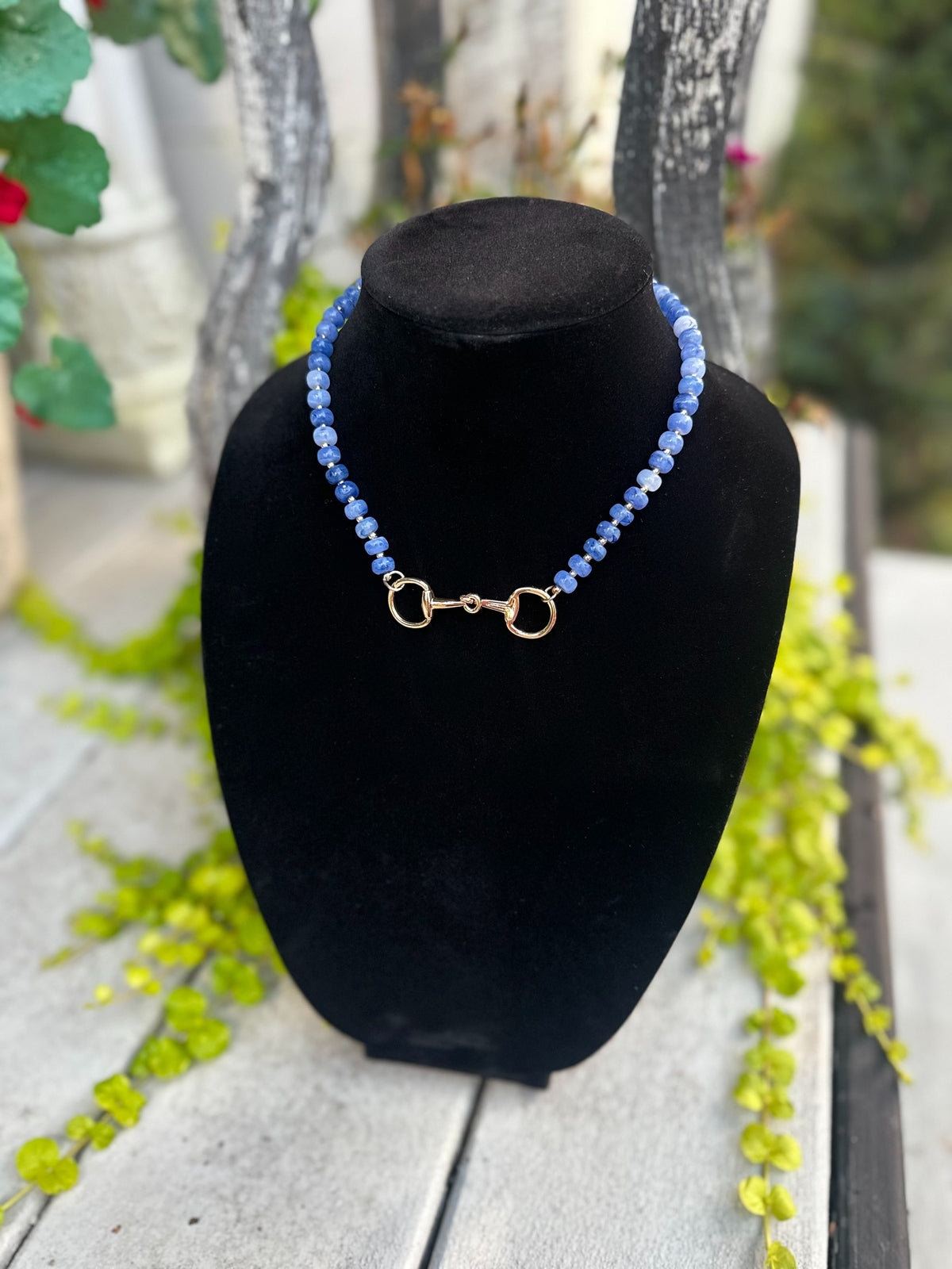 Blue beaded necklace with gold bit clasp