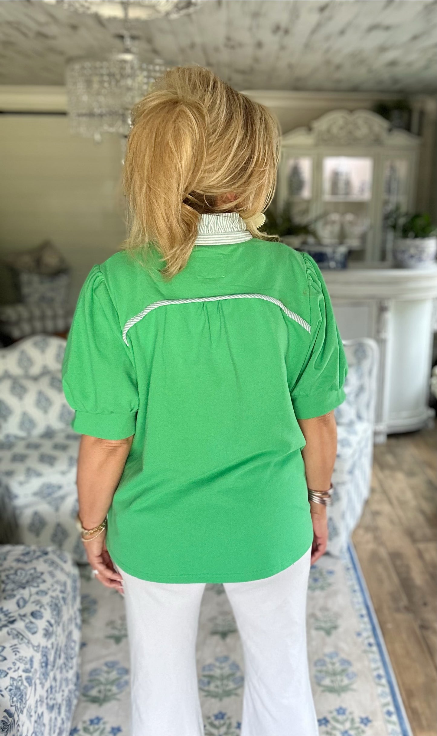 Apple green high ruffled neck top.