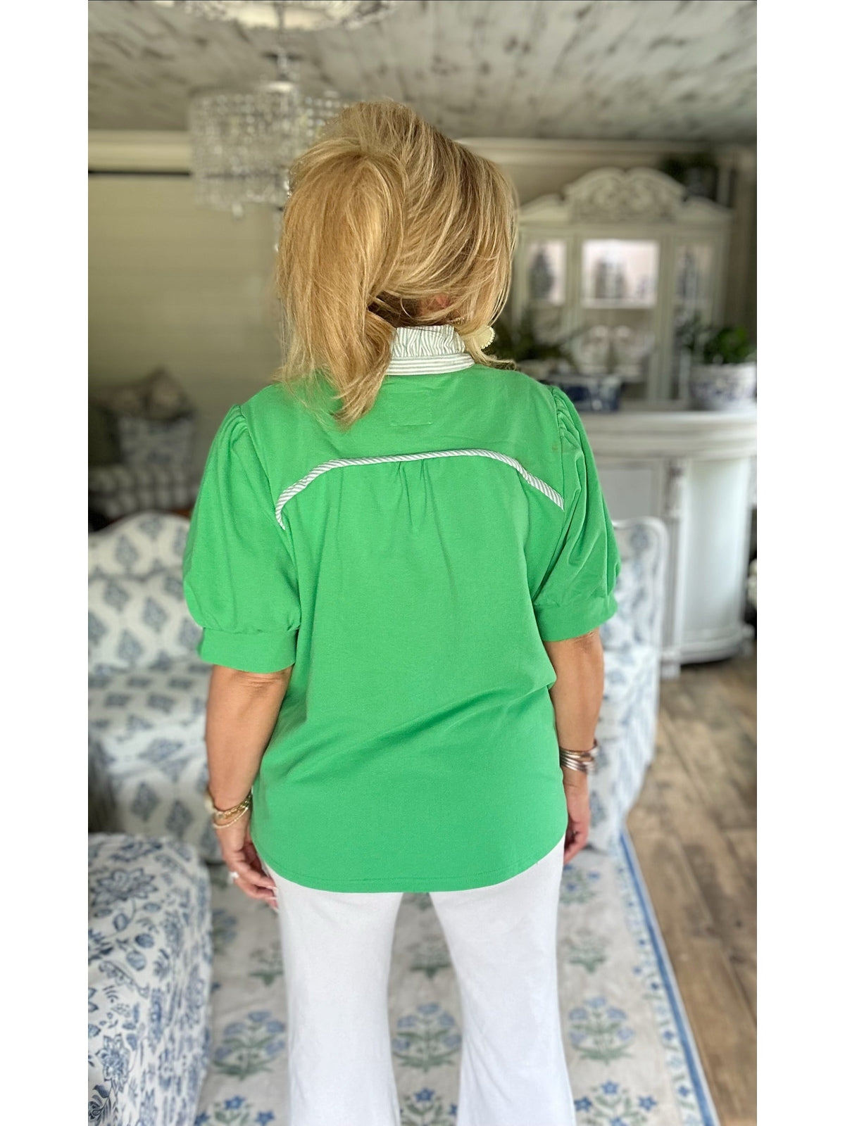 Apple green high ruffled neck top.