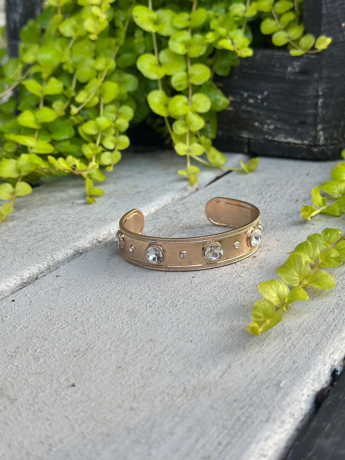 Gold cuff bracelet with clear crystals