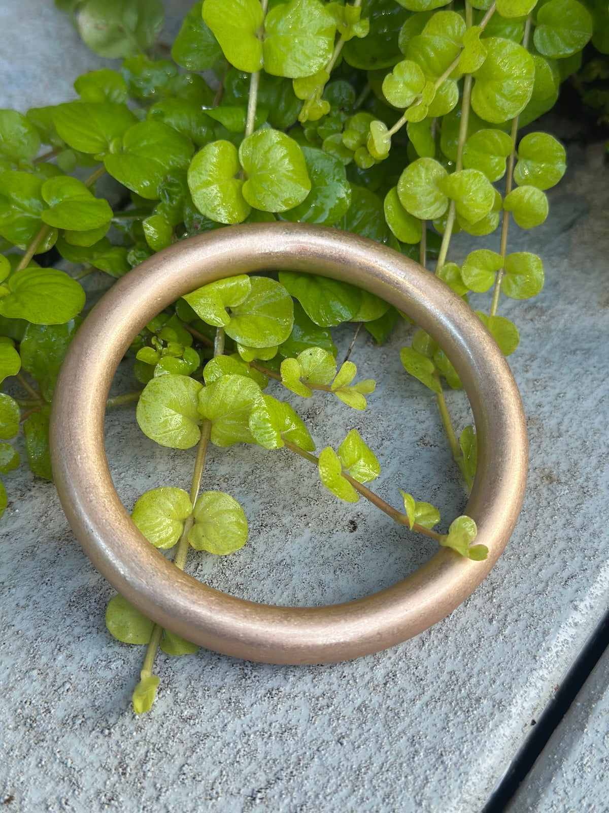 Gold, smooth bangle bracelet