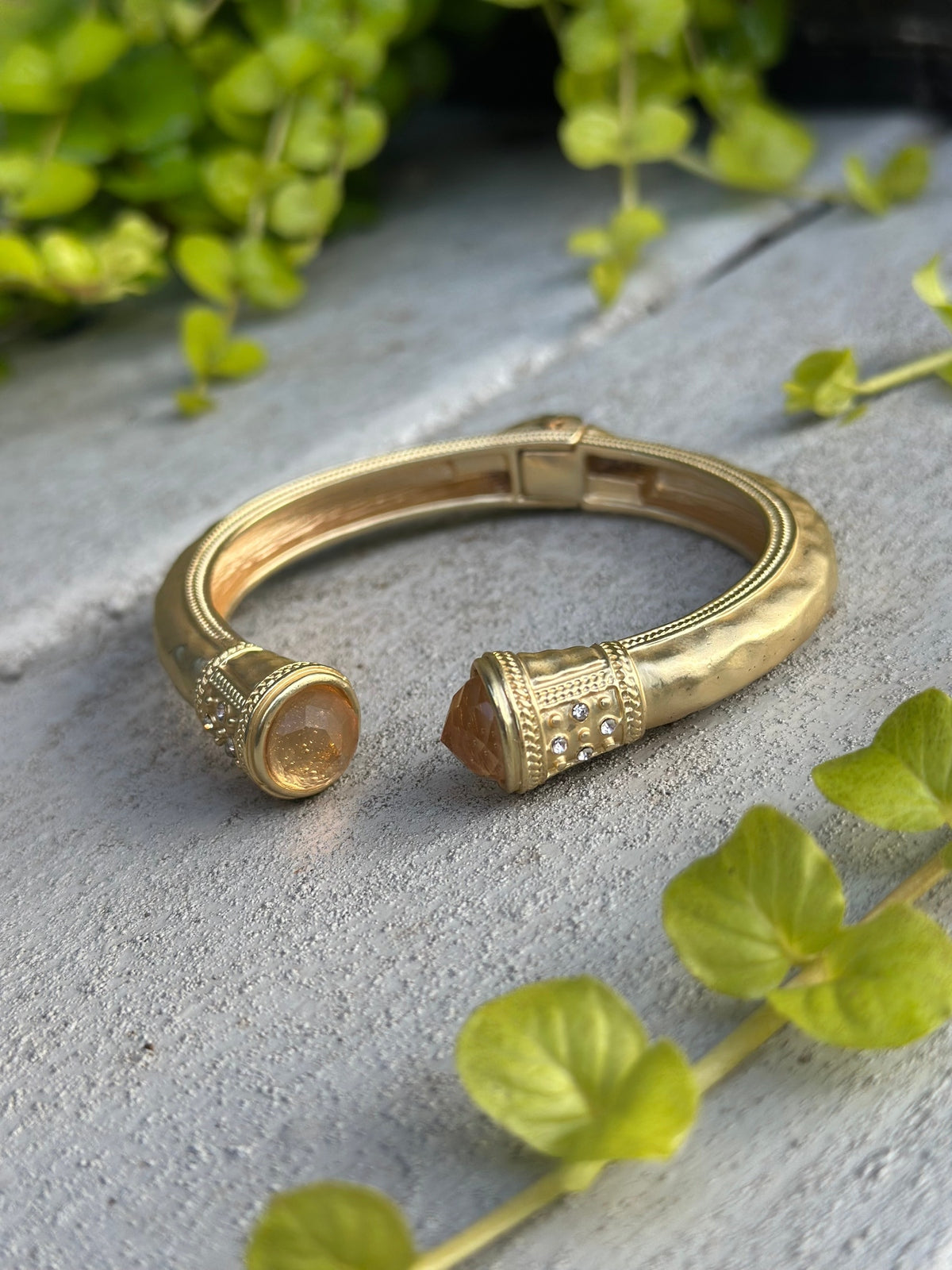 Gold cuff bangle with citrine stones