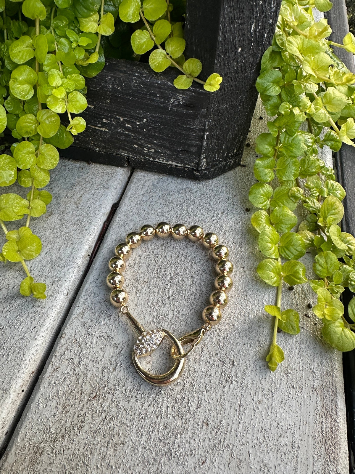  Gold beaded statement bracelet