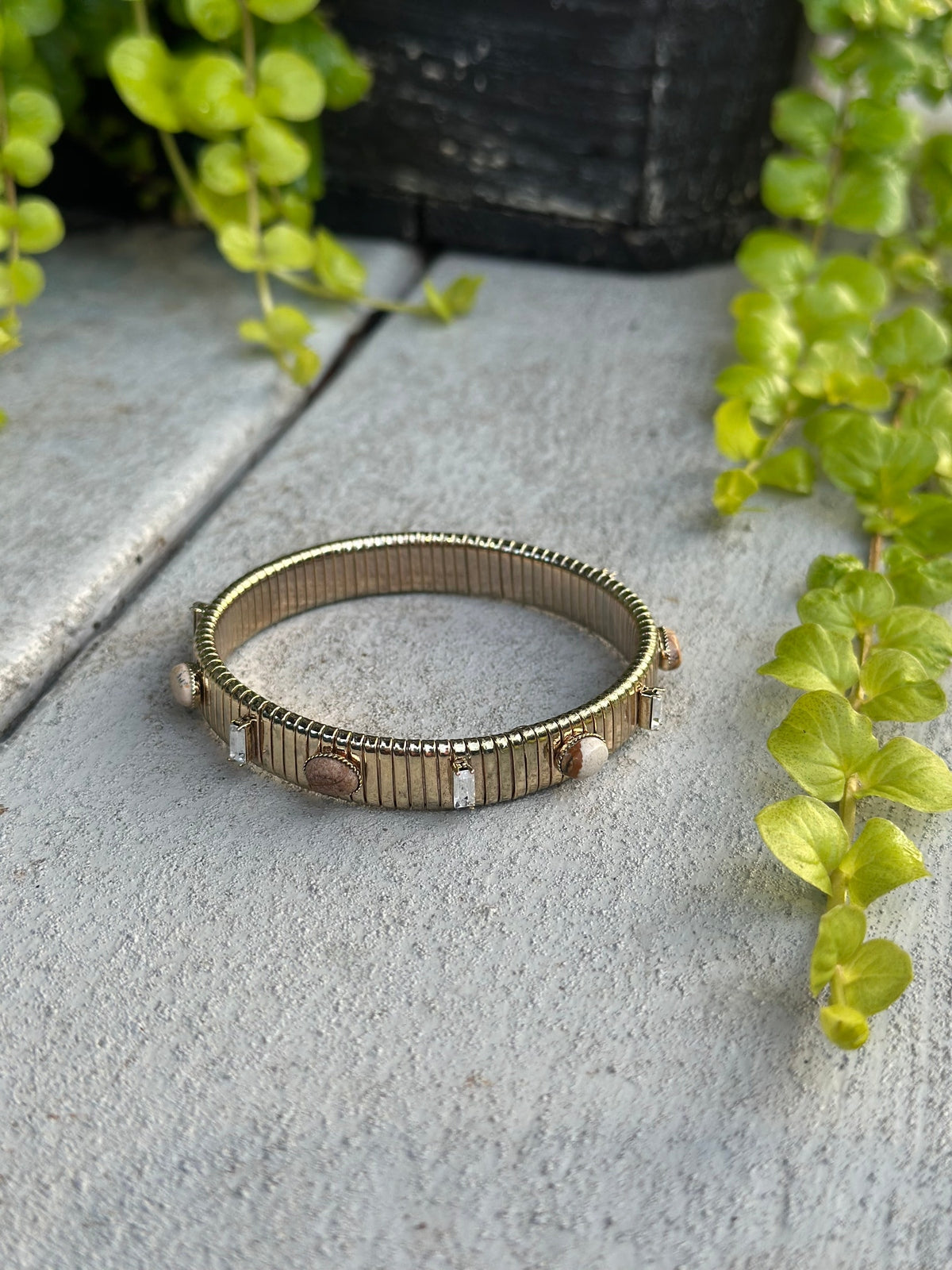 Gold ribbed stretch bracelet with stones