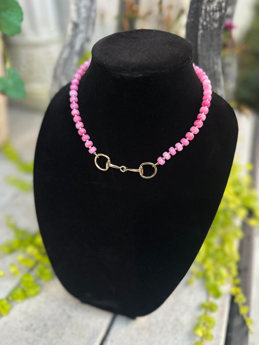 Pink beaded necklace with gold bit clasp
