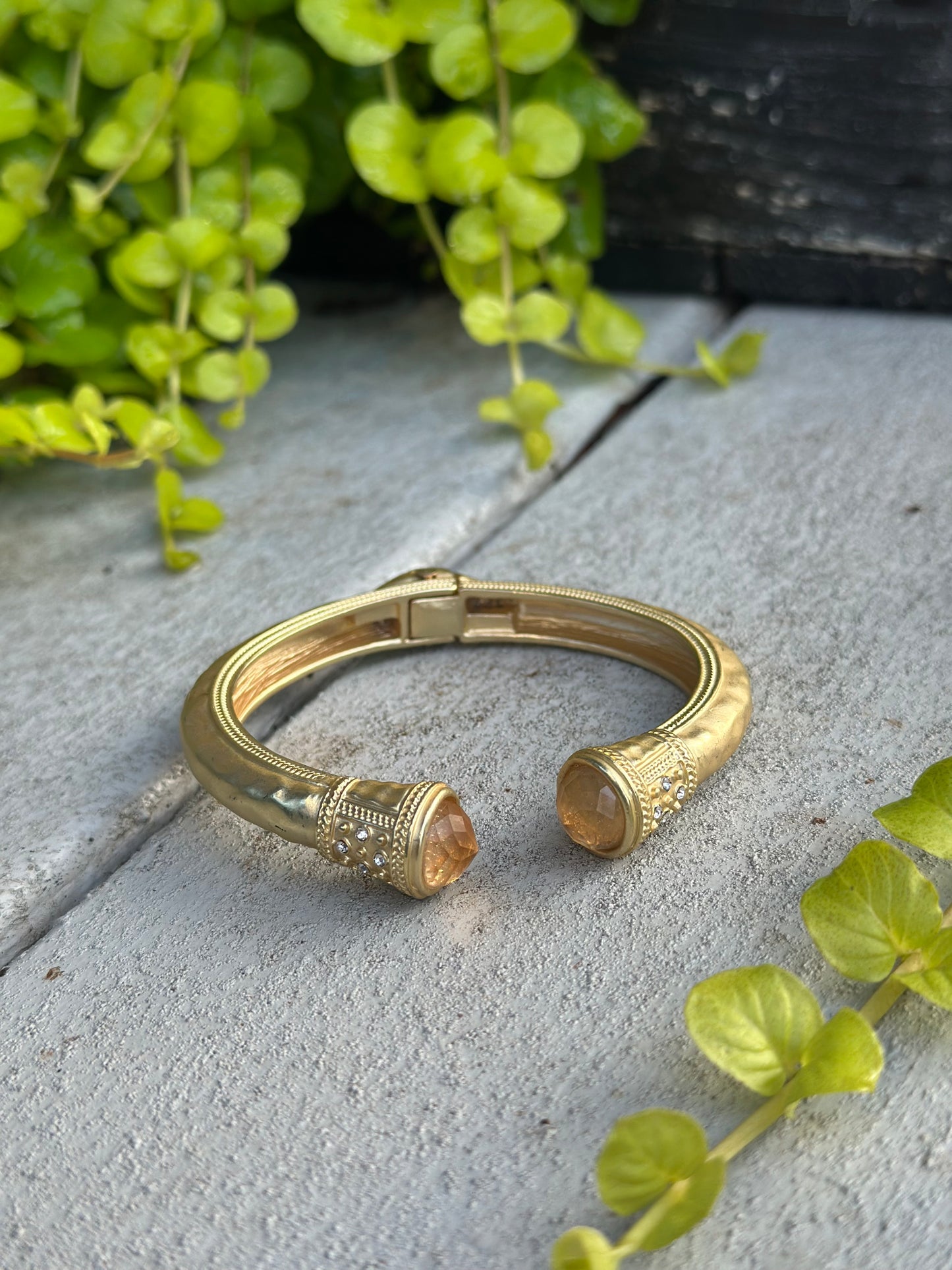 Gold cuff bangle with citrine stones