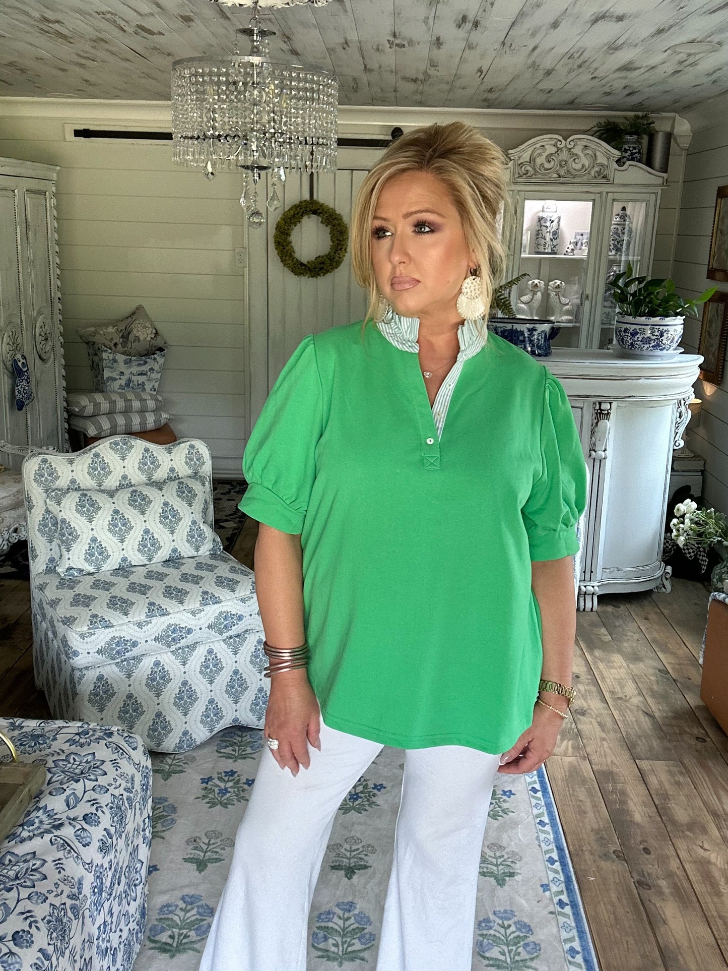 Apple green high ruffled neck top.