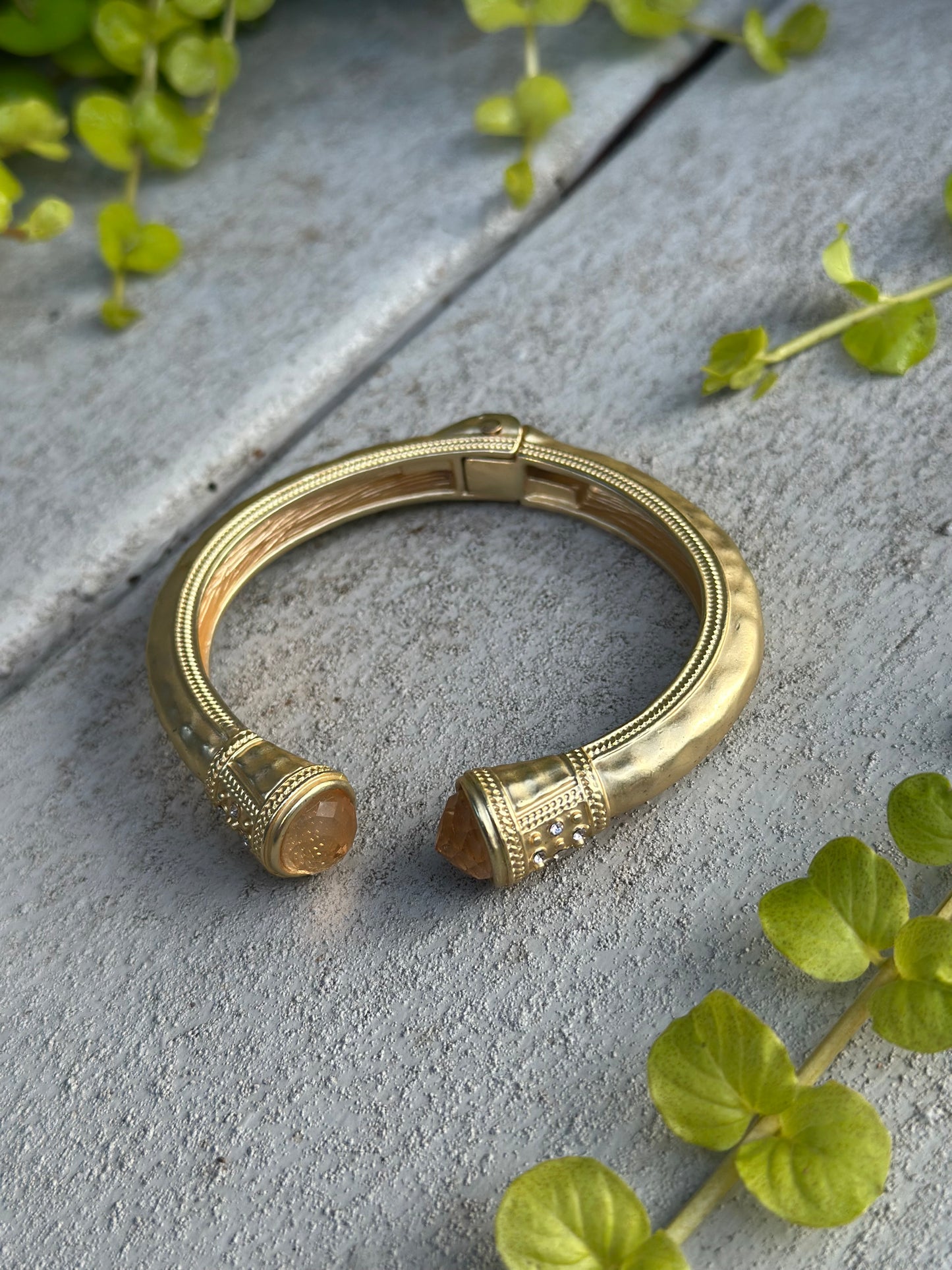 Gold cuff bangle with citrine stones