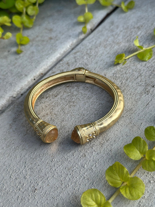 Gold cuff bangle with citrine stones