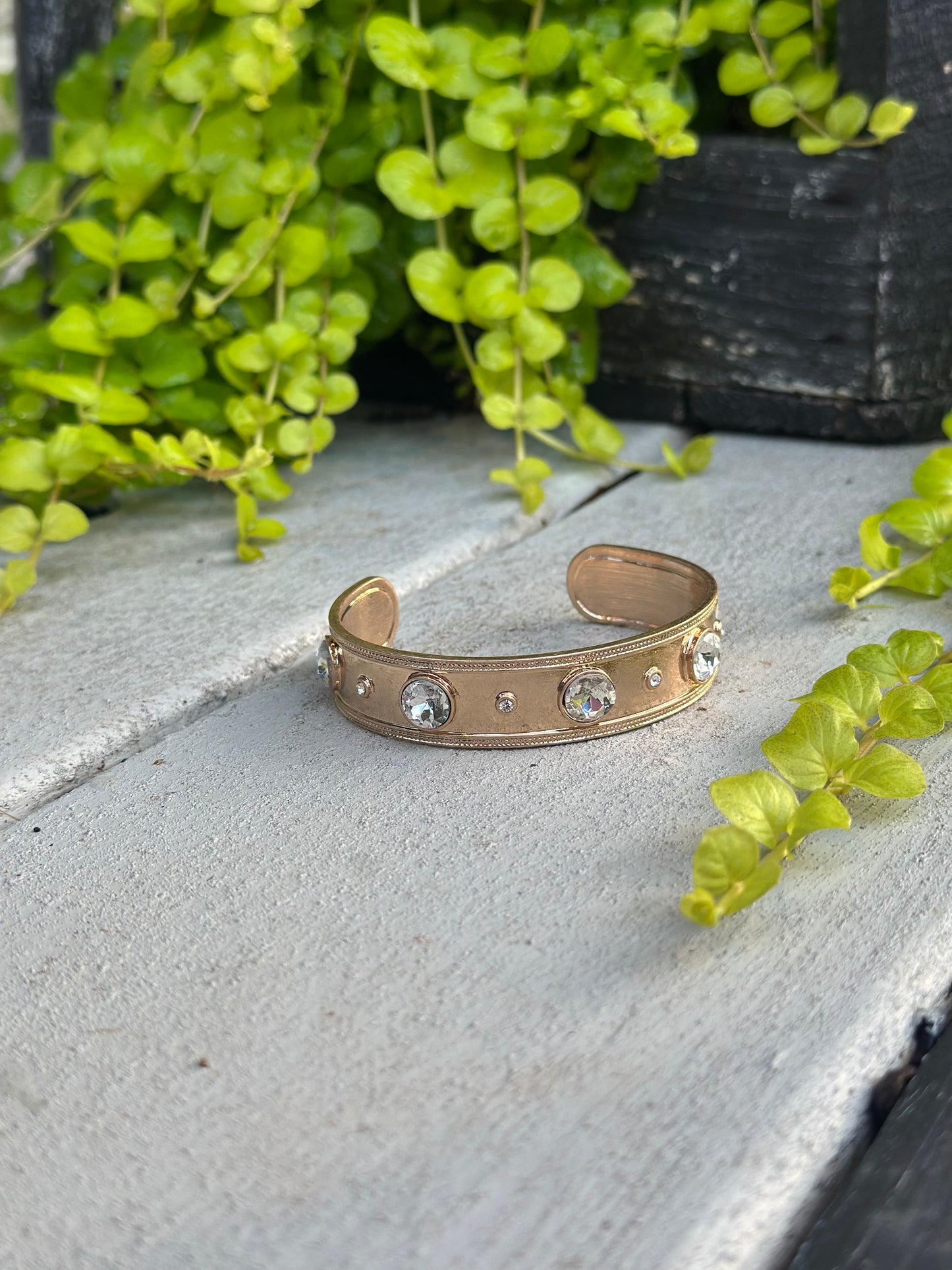 Gold cuff bracelet with clear crystals