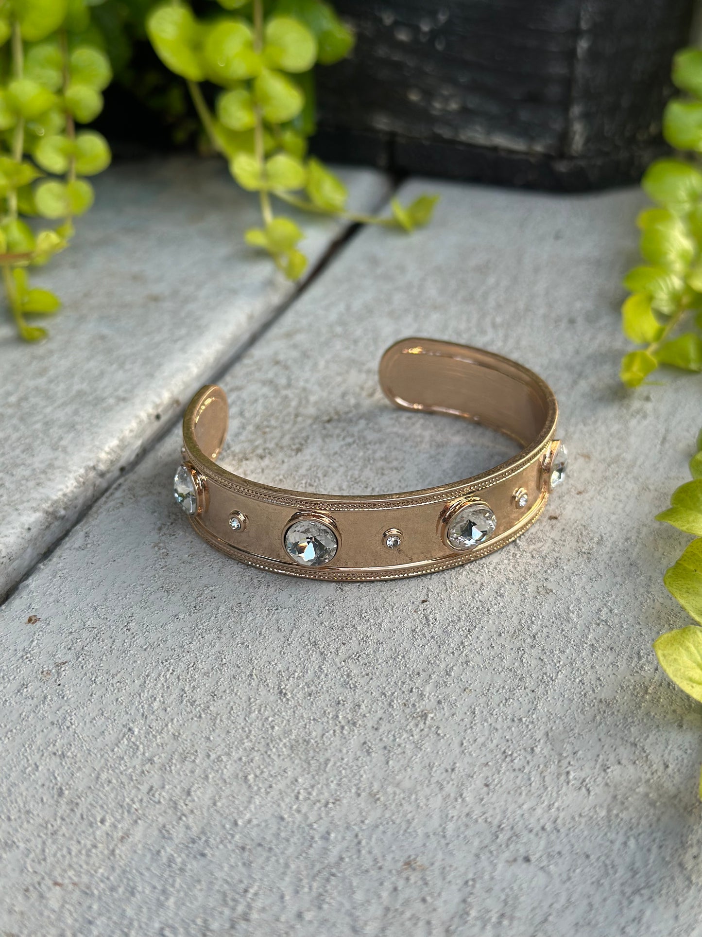 Gold cuff bracelet with clear crystals