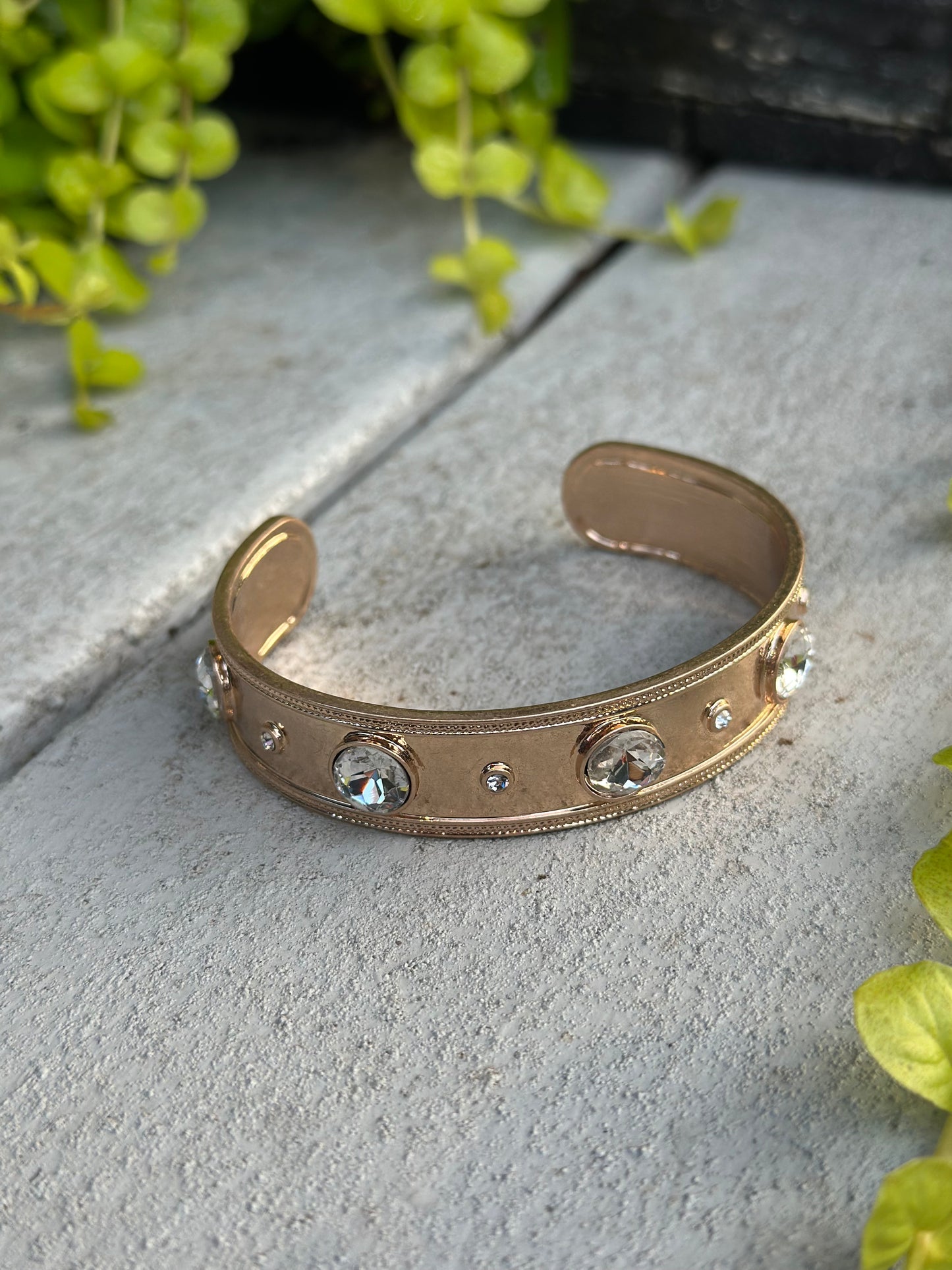 Gold cuff bracelet with clear crystals