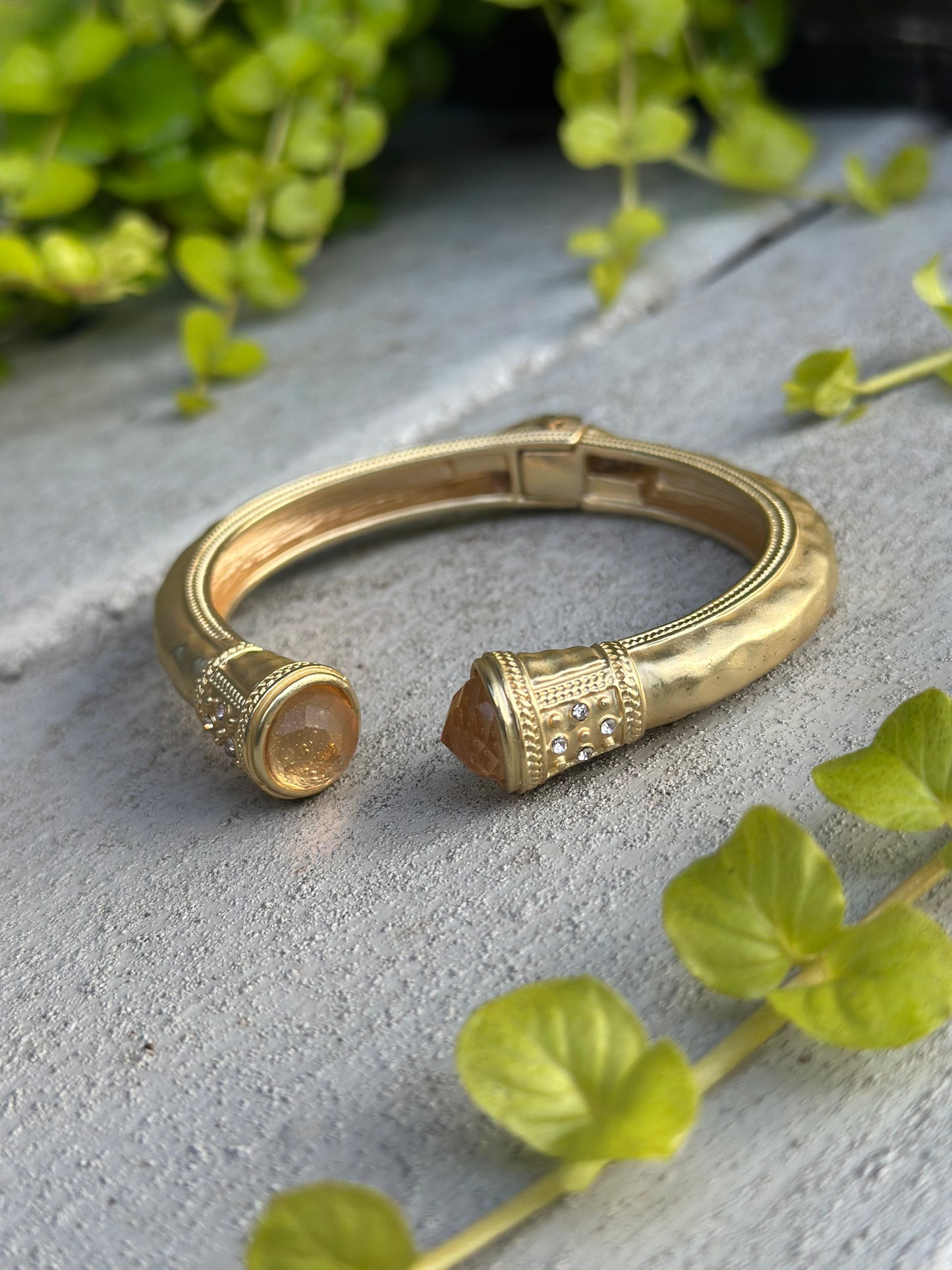 Gold cuff bangle with citrine stones