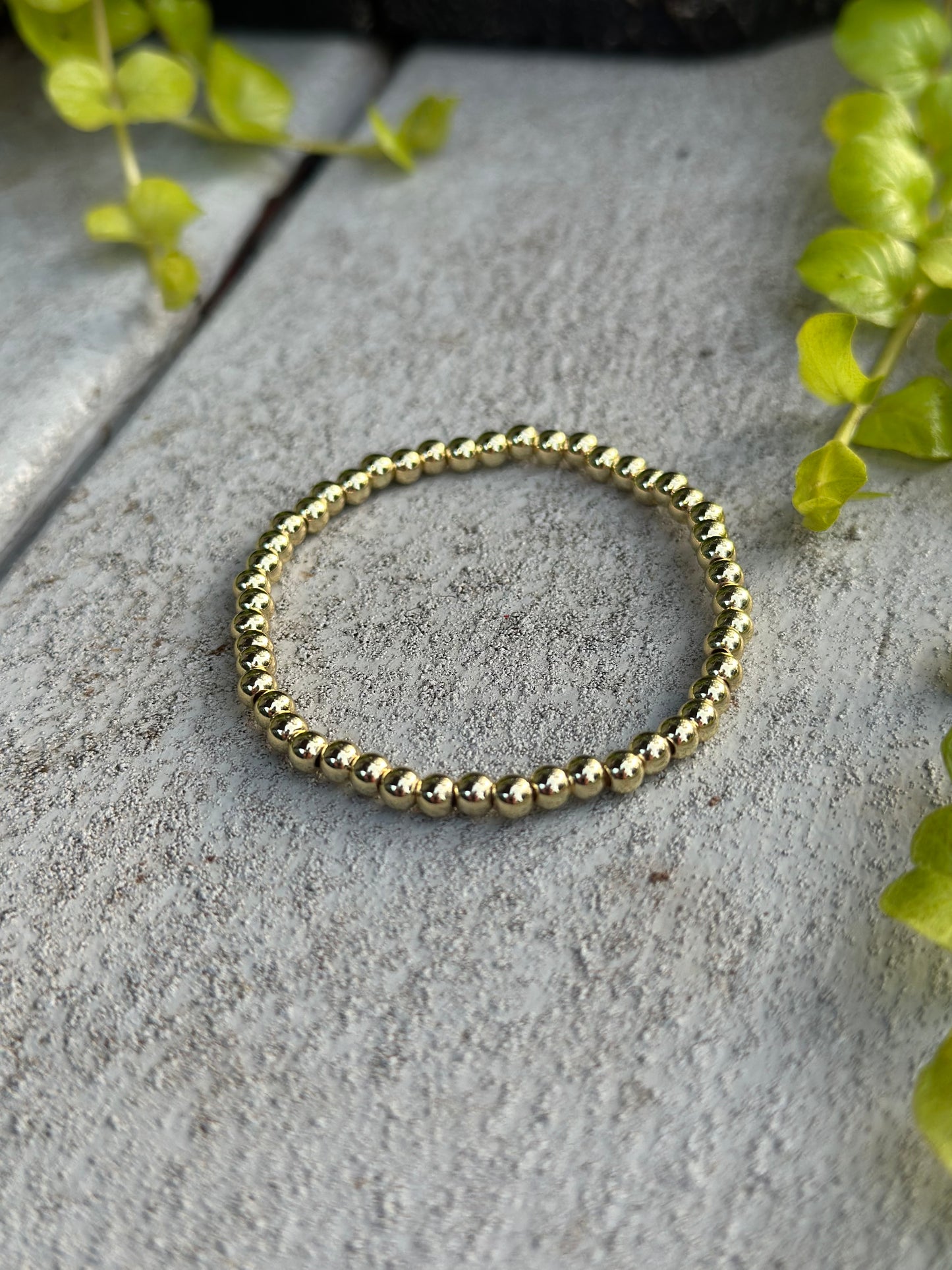 Gold beaded stretch bracelet