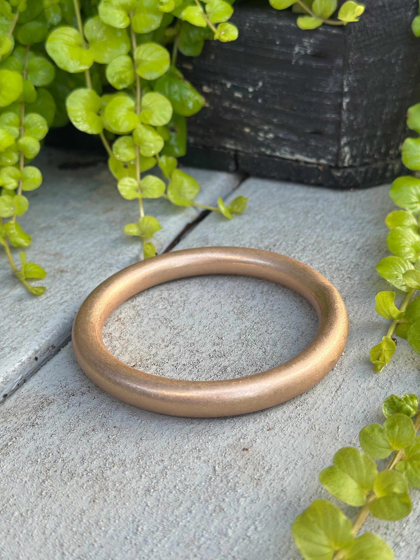 Gold, smooth bangle bracelet