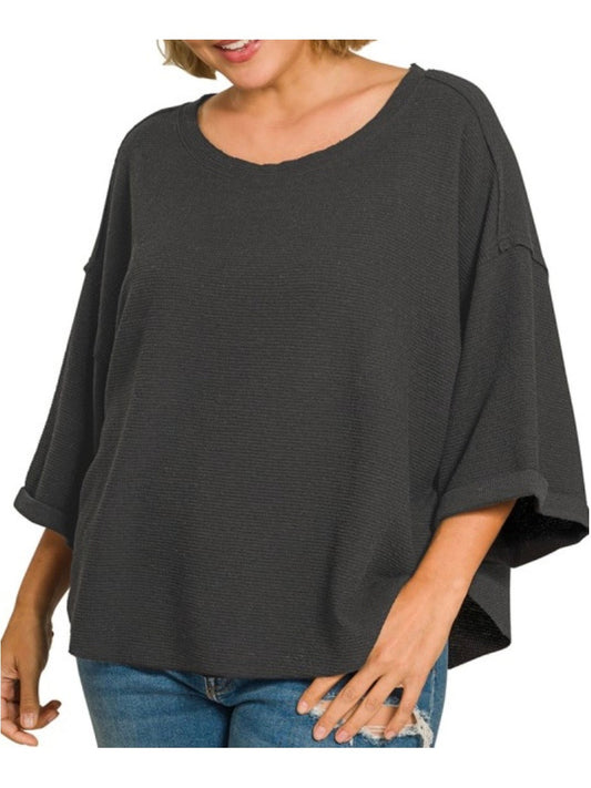 Black plus double knit curved hem short sleeve top.